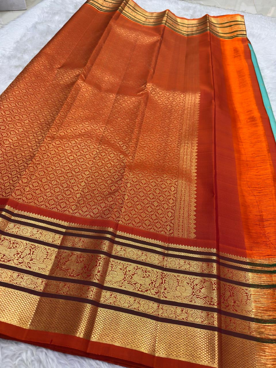 Turquoise blue Kanchi Pattu saree with Varisaipet weave and orange zari border — Idam Living