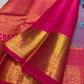 Turquoise blue body detail showing repeating gold zari buttas.
