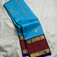 Turquoise blue pure silk Kanjipuram Rettapet saree with Aadum Mayil zari motifs, full drape view