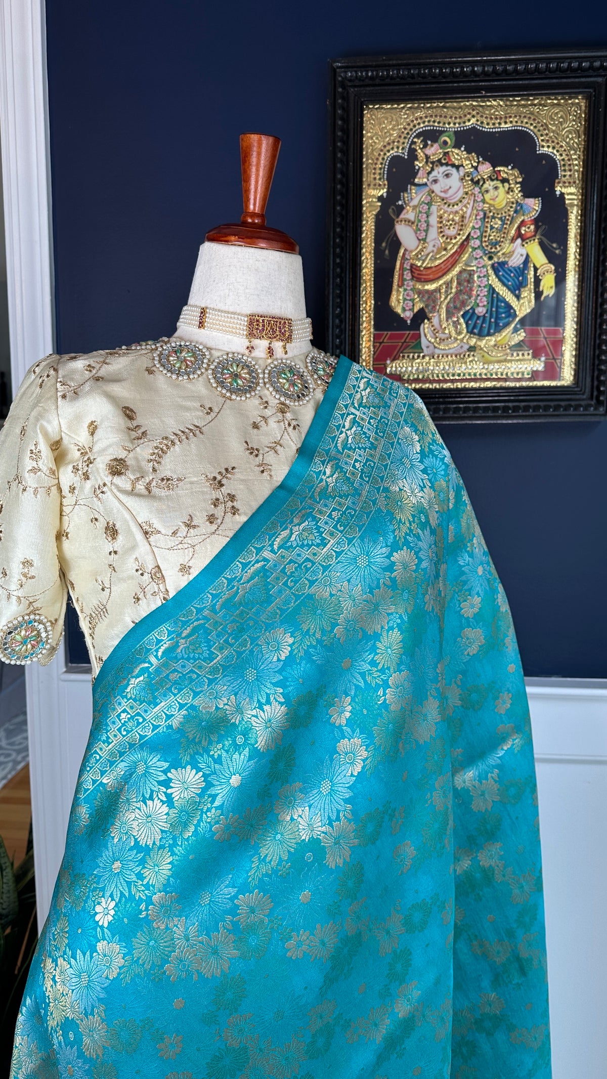 Close view of zari buttas on blue green Pure Katan Silk Banarasi saree