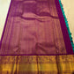 Deep Purple and gold Korvai pallu showing geometric zari lattice, ornamental registers and Turquoise Blue Kanchipuram silk.