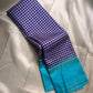 Turquoise border of the indigo and ivory check pure silk Kanjivaram saree