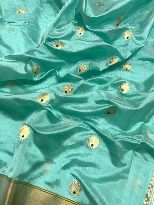 Aqua Blue Chanderi silk saree pallu showing the broad pale metallic woven field with fine textural patterning