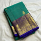 Turquoise green Kanchipuram saree with Gandaberunda zari buttas