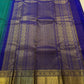 Purple gold zari pallu on turquoise green Kanjivaram