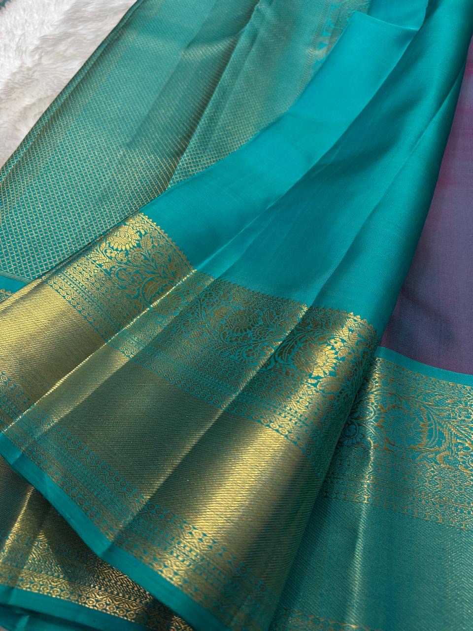 Turquoise Kanchipuram border with dense floral Kodi-Valli thanga-zari work