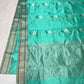 Aqua Turquoise Chanderi saree border detail with silver banding and fine deep green lines