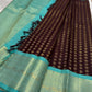 Turquoise zari border with fine chevrons, geometric bands and repeating ornamental motifs.