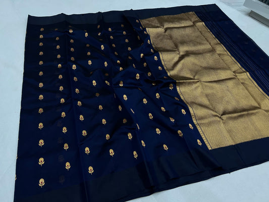 Navy Pure Silk Chanderi Saree neatly folded with Gold Butta Border