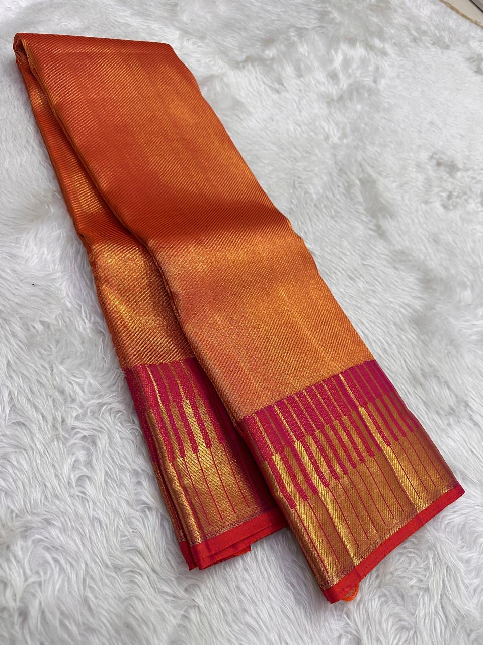 Radiant orange dense Ettukol Kancheepuram silk saree with broad Vadamalli gold border