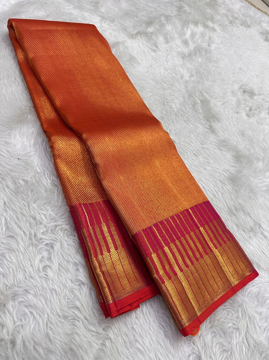 Radiant orange dense Ettukol Kancheepuram silk saree with broad Vadamalli gold border