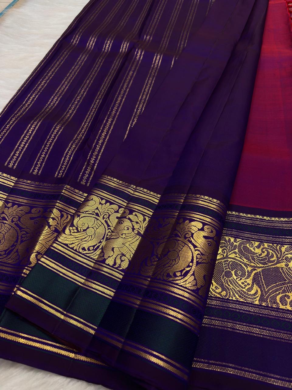 Full view of the Vadamalli magenta Butta silk saree with royal blue border