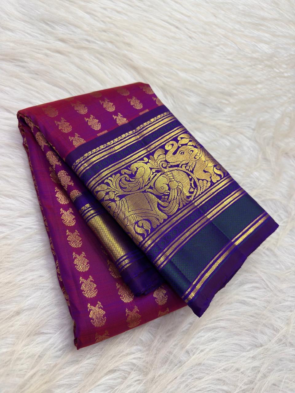 Vadamalli magenta handwoven Pure Silk Kanchipuram Butta saree with royal blue border