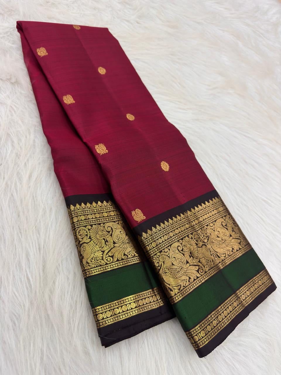 Thulir Pachai Kanchipuram silk saree with black and emerald-green contrast