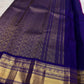 Vadamalli Magenta-Purple Kanchipuram body scattered with traditional gold zari buttas.