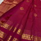 Close view of antique-gold checked zari grid on Pomegranate Pink Kanjivaram silk.