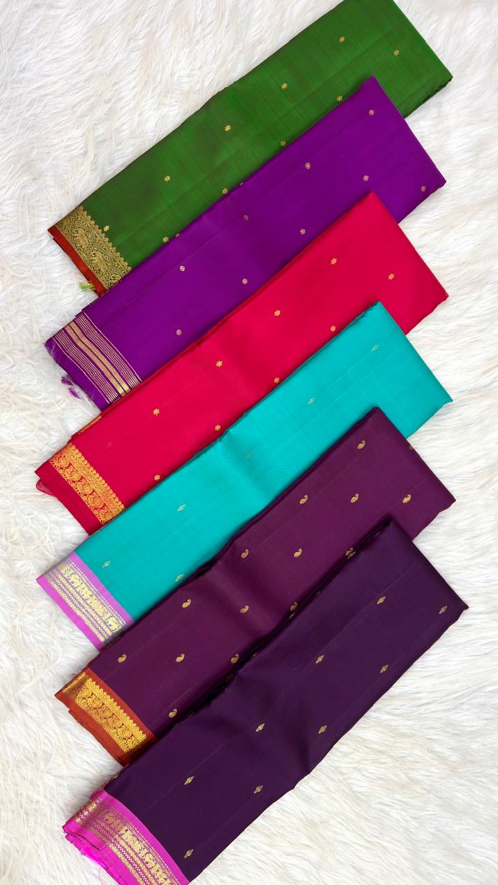 Close view of the restrained linear gold zari border on Vadamalli purple pure silk.