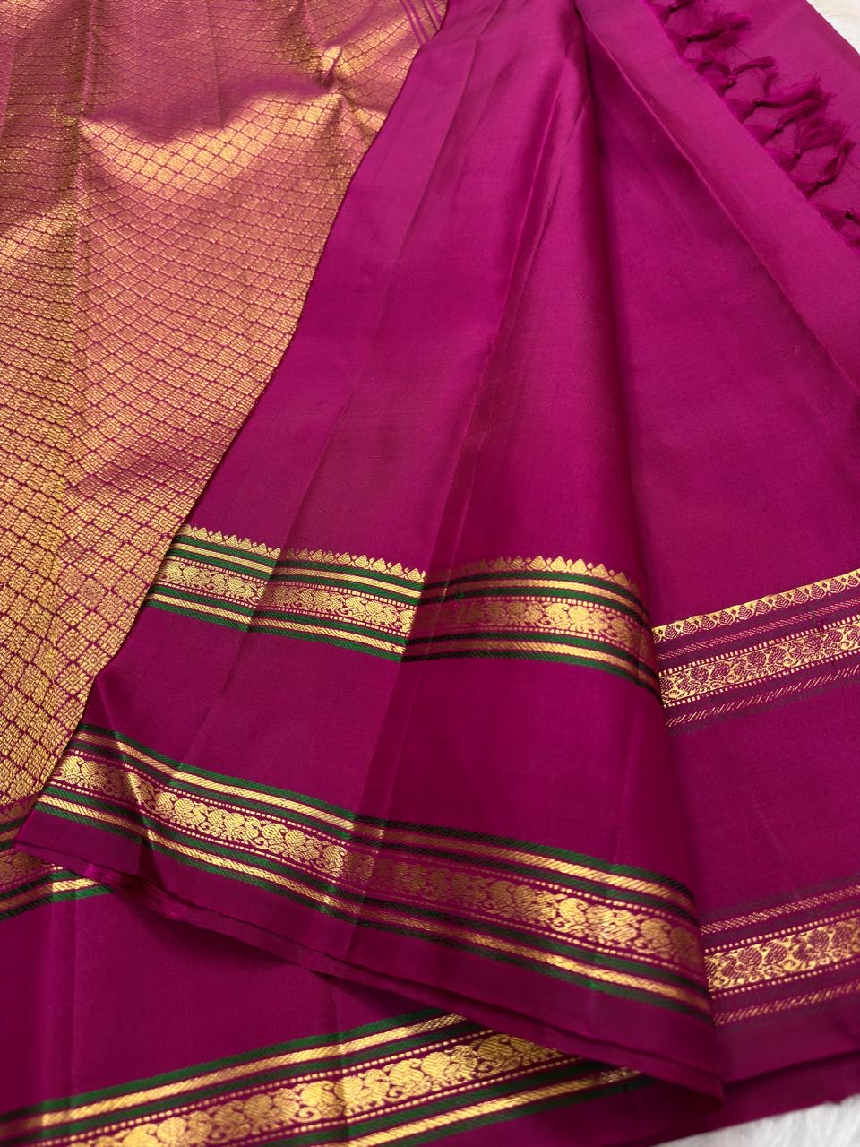 Vadamalli Magenta Handwoven Pure Silk Kanjivaram Rettapet Saree with Green-Accented Gold Zari Border