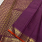 Traditional elephant motif border in antique gold on Vadamalli Purple Kanjivaram saree.