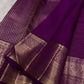 Traditional antique-gold floral butta on Vadamalli Purple Kanjivaram silk.