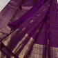 Broad antique-gold woven border on Vadamalli Purple Kanjivaram saree.