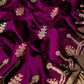 Close view of purple Chanderi silk saree with multicolour gold-toned woven motifs and ornamental border