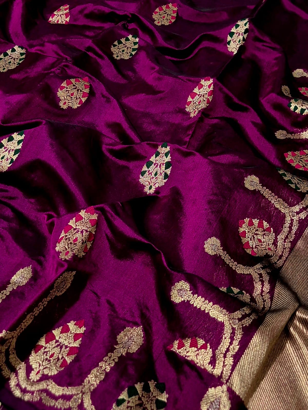 Close view of purple Chanderi silk saree with multicolour gold-toned woven motifs and ornamental border