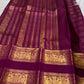 Deep purple Pure Silk Kanjivaram with spaced zari buttas and repeated gold zari lines