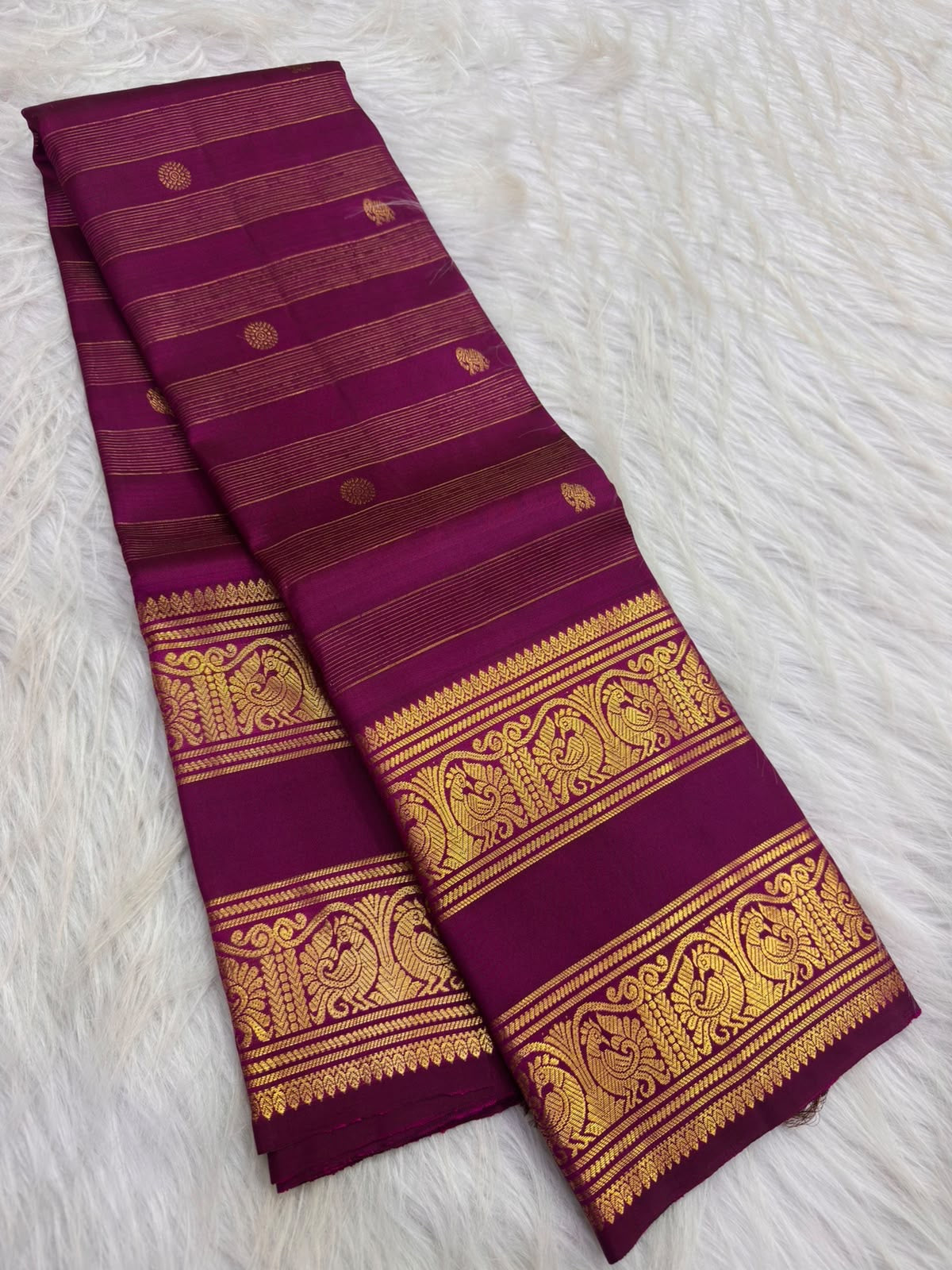 Vadamalli purple Rettapet Kanjivaram saree with lengthwise zari lines and ornate layered border