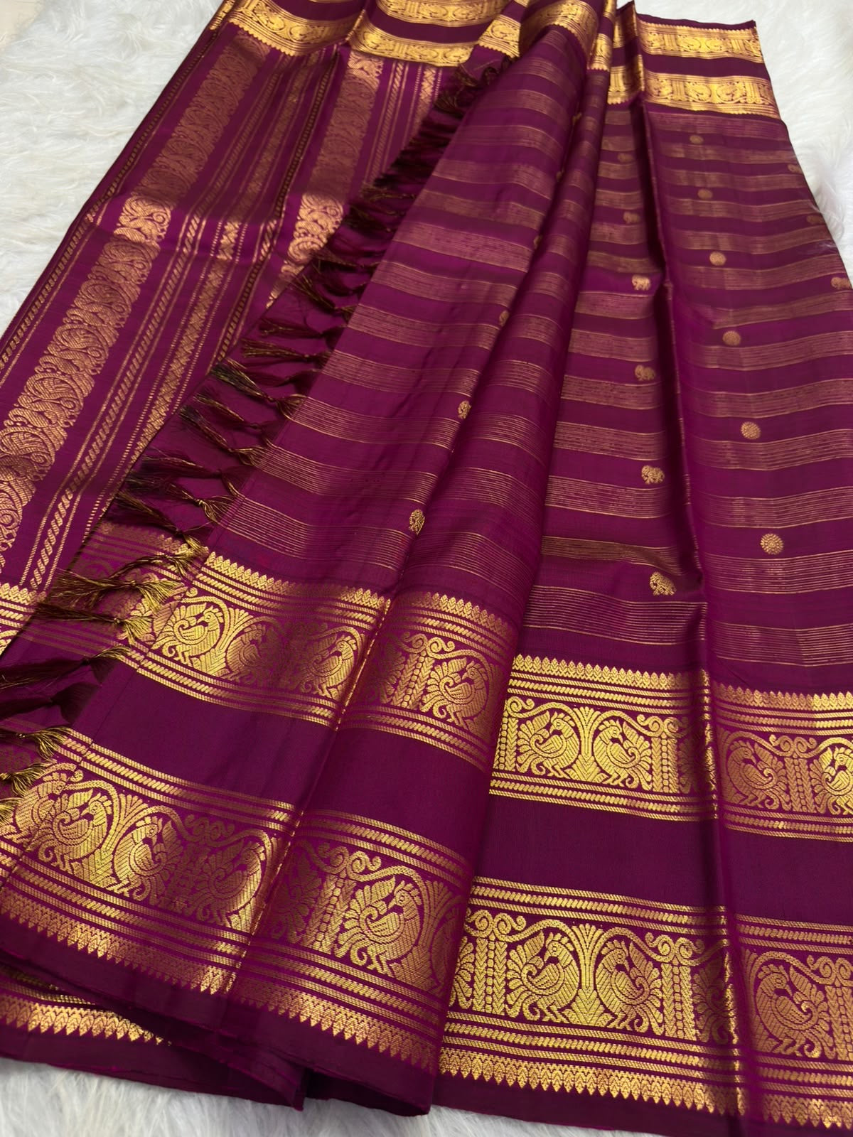 Layered Rettapet border with handwoven mayil panels on Vadamalli purple Kanjivaram silk