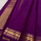 Saturated purple silk body showing individually spaced small classic-gold zari buttas.