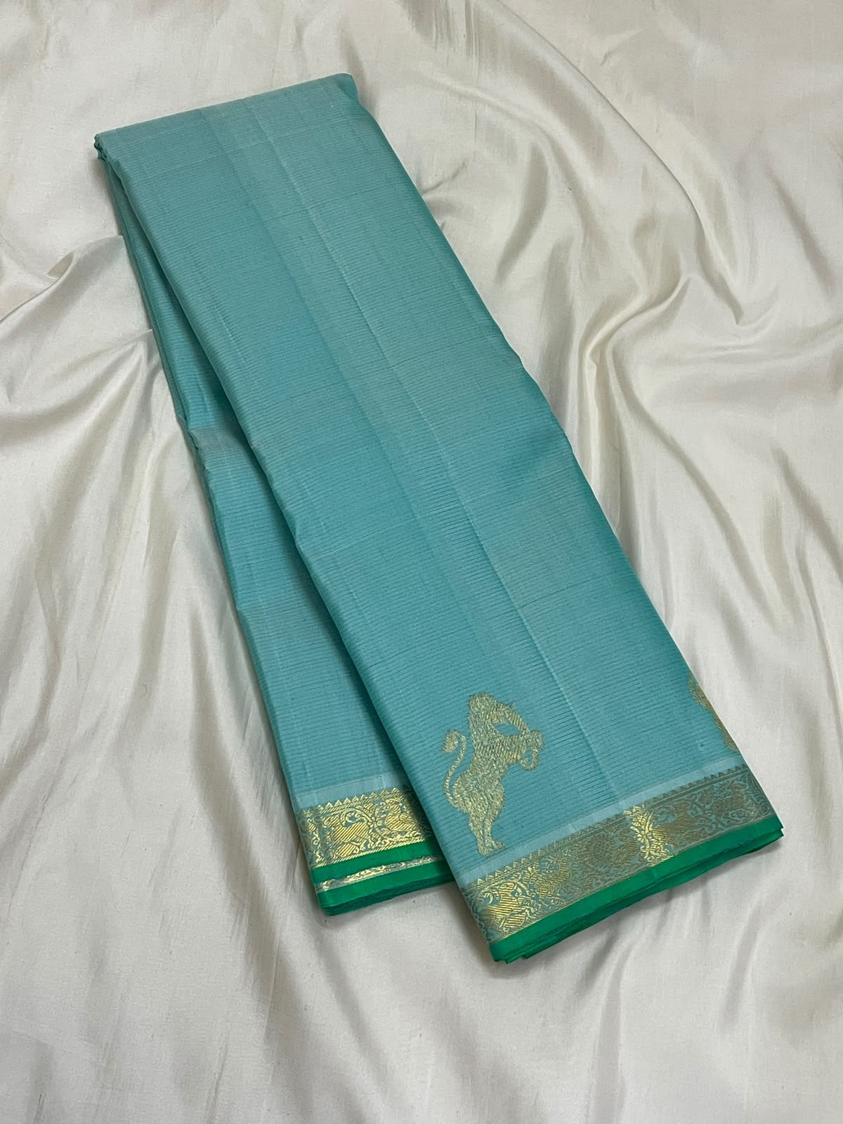 Vairaoosi Aqua Blue pure silk Kanjivaram saree draped view