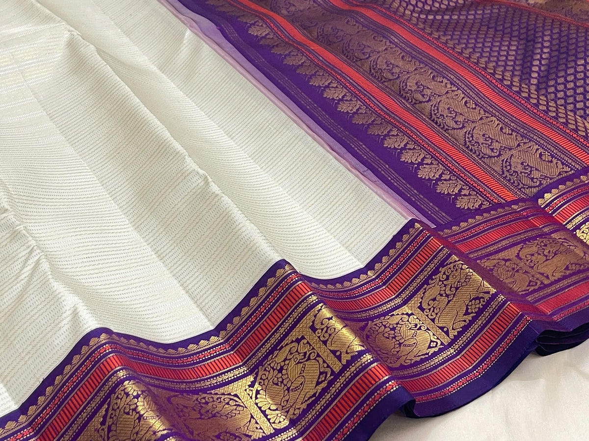Warm Ivory Handwoven Pure Silk Kanchipuram Saree with Purple Border and Veldhari Detail, body and border detail