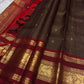 Deep Coffee Brown Zari Kattam silk showing fine gold checks and elaborate Arakku Red Vanasringaram border.