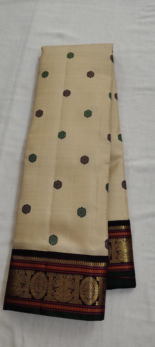 Vanilla Ivory Korvai Kanchipuram Silk Saree with Forest Emerald and Aubergine Purple Pure Zari Pallu