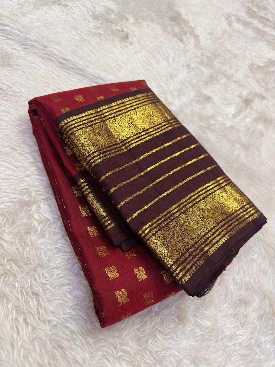 Authentic Kancheepuram silk saree featuring deep wine red and earthy coffee brown heirloom palette
