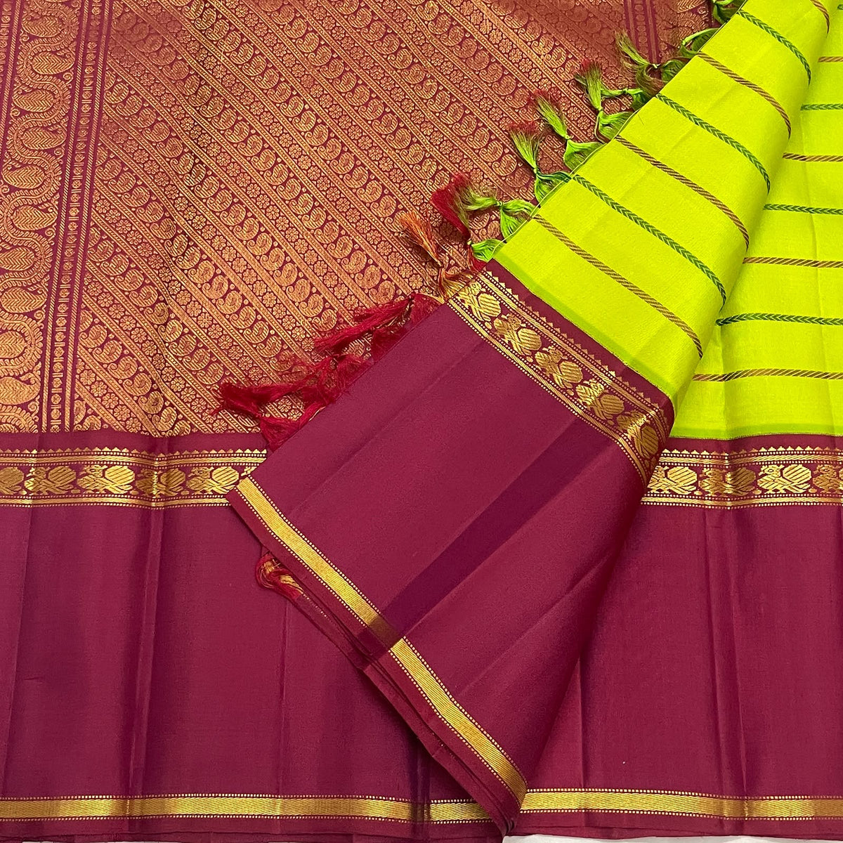 Kili Pachai Green Handwoven Pure Silk Kanjipuram Saree with Rettapet Border and Veldhari Stripes, contrasting zari border detail