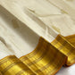 Venpattu Ivory Pure Silk Kanchipuram Butta Saree with Manjal Gold Pettu