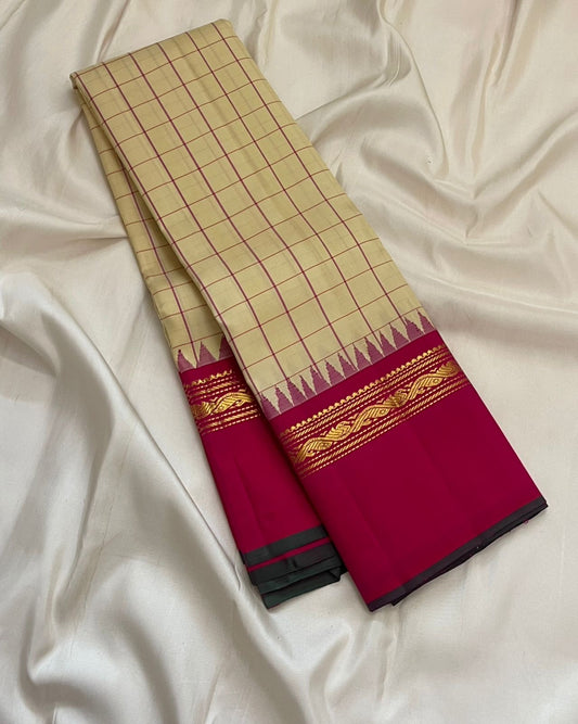 Pure Kanchipuram silk saree in cream ivory with kanchi kattam check weave and traditional gold zari kaal irangiya border