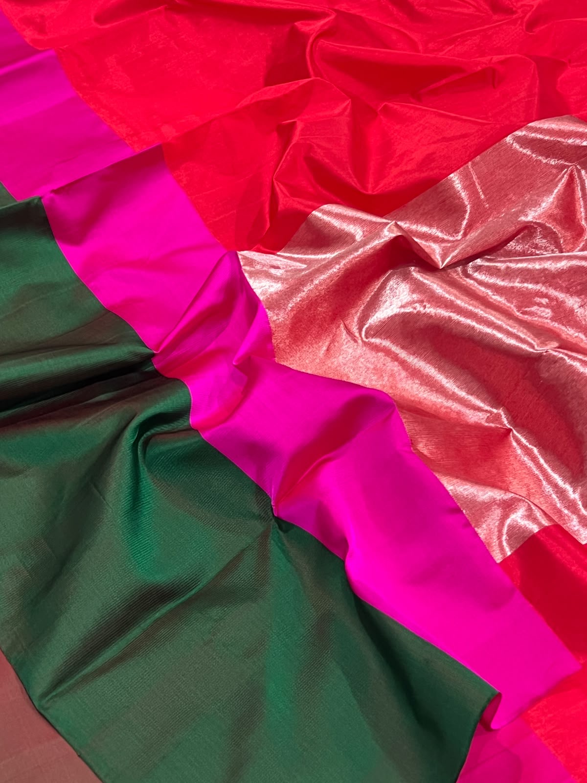 Close view of vermilion Pattu Silk Chanderi with lustrous Mashru Silk border