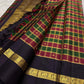 Vermilion and green square silk colour fields on a pure silk Paalum Pazhamum saree