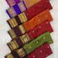 Deep vermilion red Kanjeevaram silk saree pallu with geometric gold zari pattern