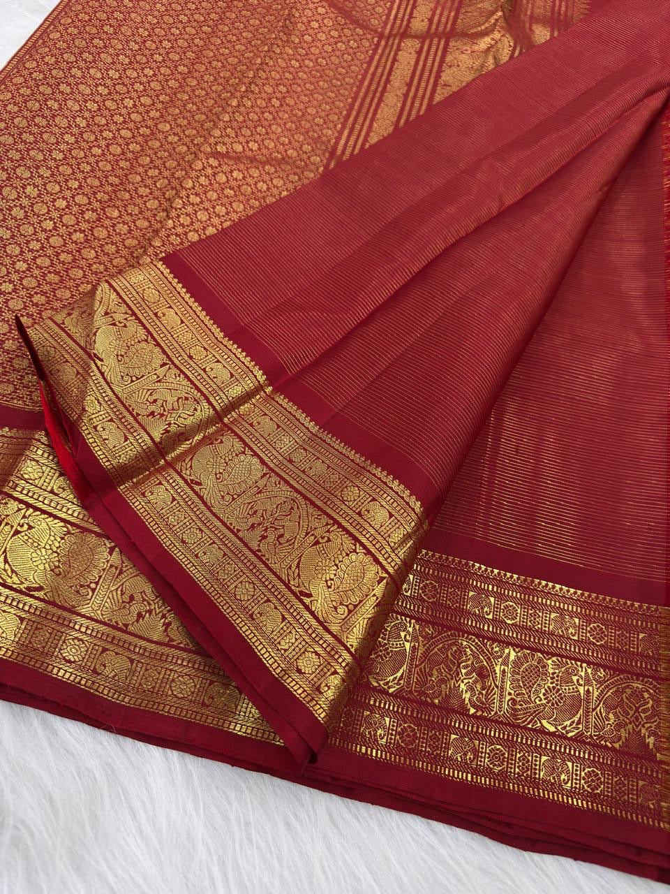 Vermilion Red pure silk Kanchipuram saree — needle stripe