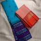 Vermilion orange Kaal Irangiya zari border on soft peach pink Kanjipuram saree