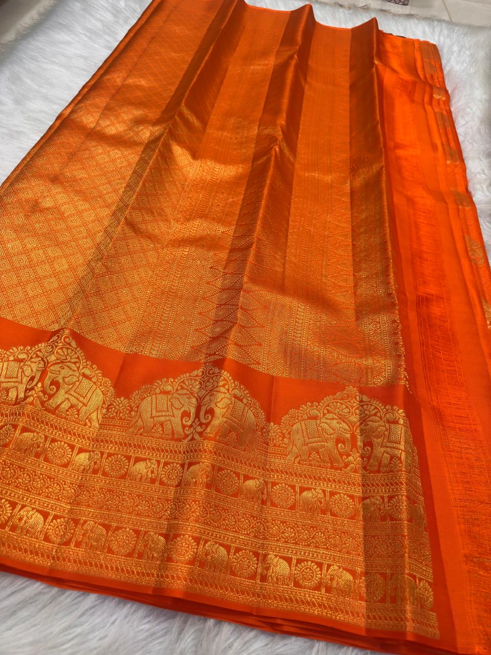 Vermilion orange Kanchipuram saree with traditional motifs, Idam Living