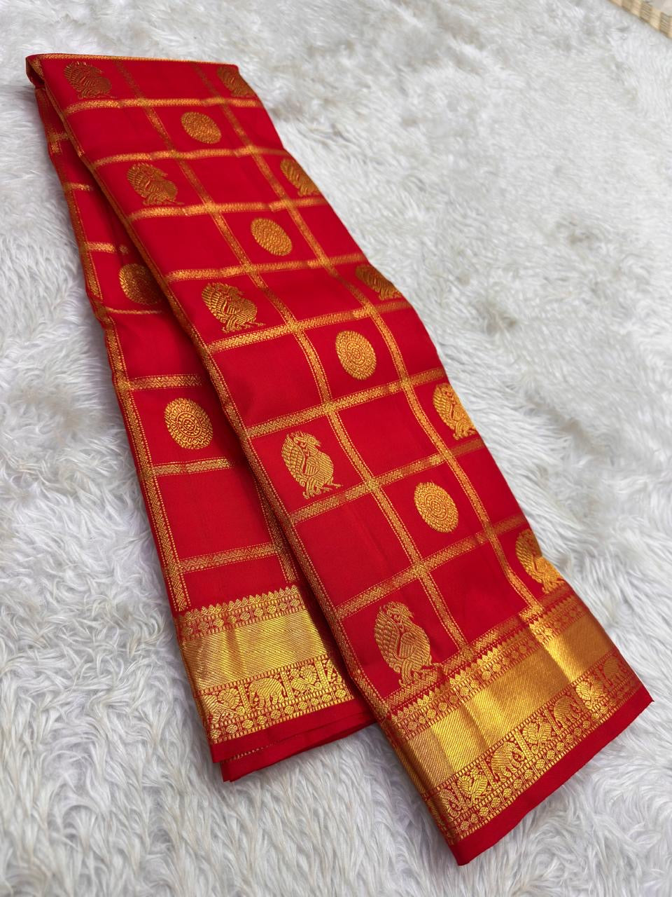 Vermilion orange pure silk Zari Kattam KanchiPattu saree, draped front view