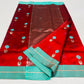 Vermilion Red handloom Pattu Silk Chanderi saree with Aqua Blue floral buttas and broad aqua contrast border