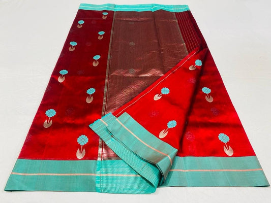 Vermilion Red handloom Pattu Silk Chanderi saree with Aqua Blue floral buttas and broad aqua contrast border