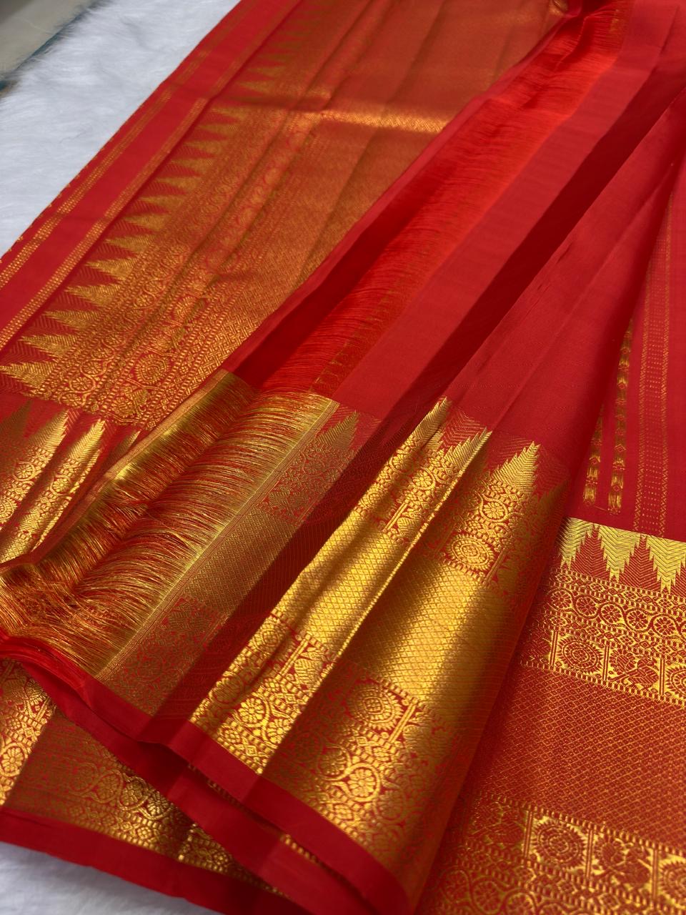 Vermilion Red Handwoven Pure Silk Kancheepuram Saree with Kamalam Diamond Butta and Temple Border