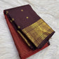 Vermilion red Kanjipuram saree – close-up of the dark maroon border